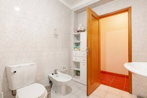 Hair dryer, bidet, towels, soap
