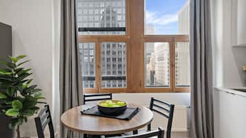 Comfort Apartment, City View | Private kitchen | Highchair