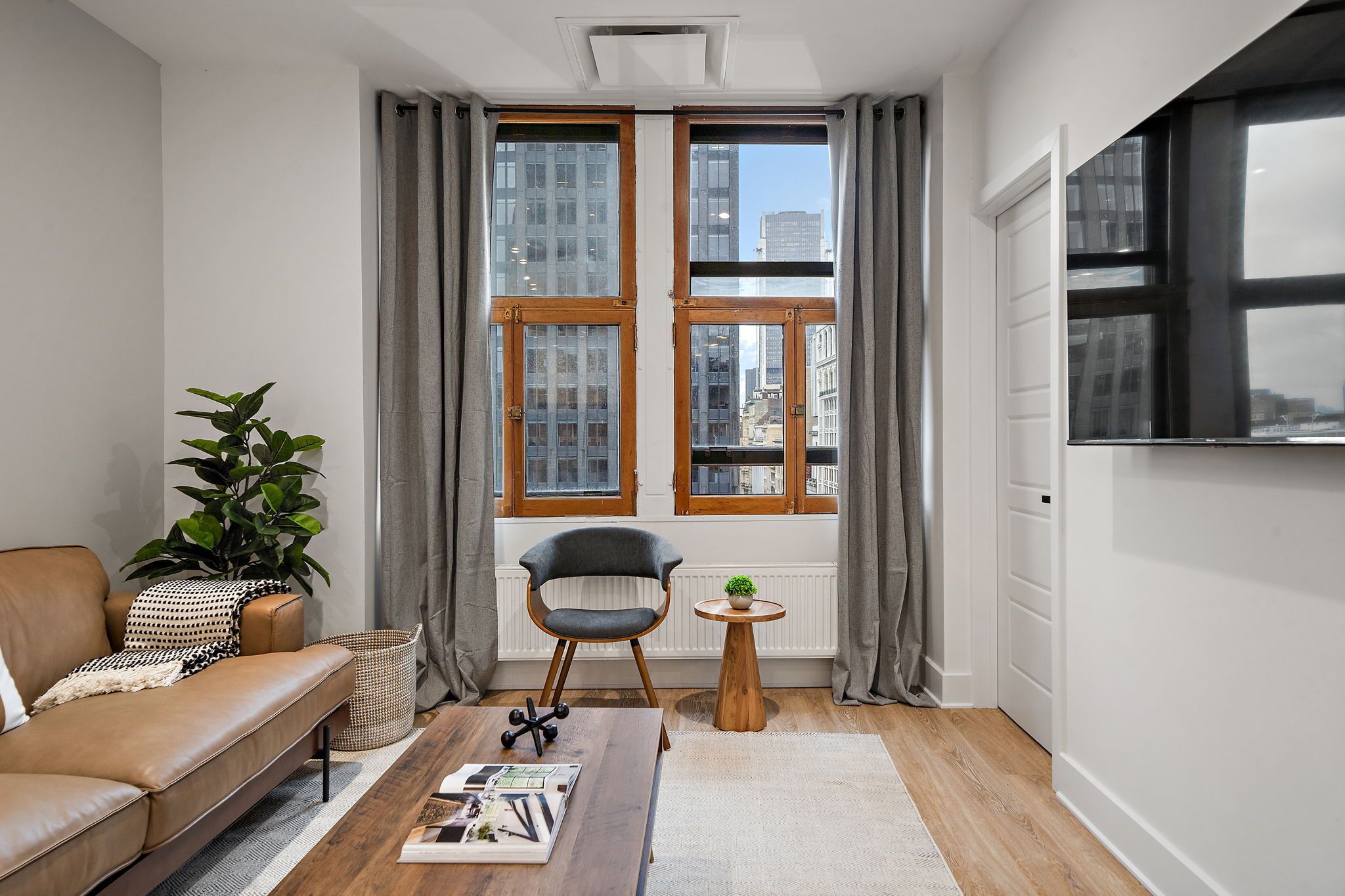 Apartamento premium, vista para a cidade | Área de estar
