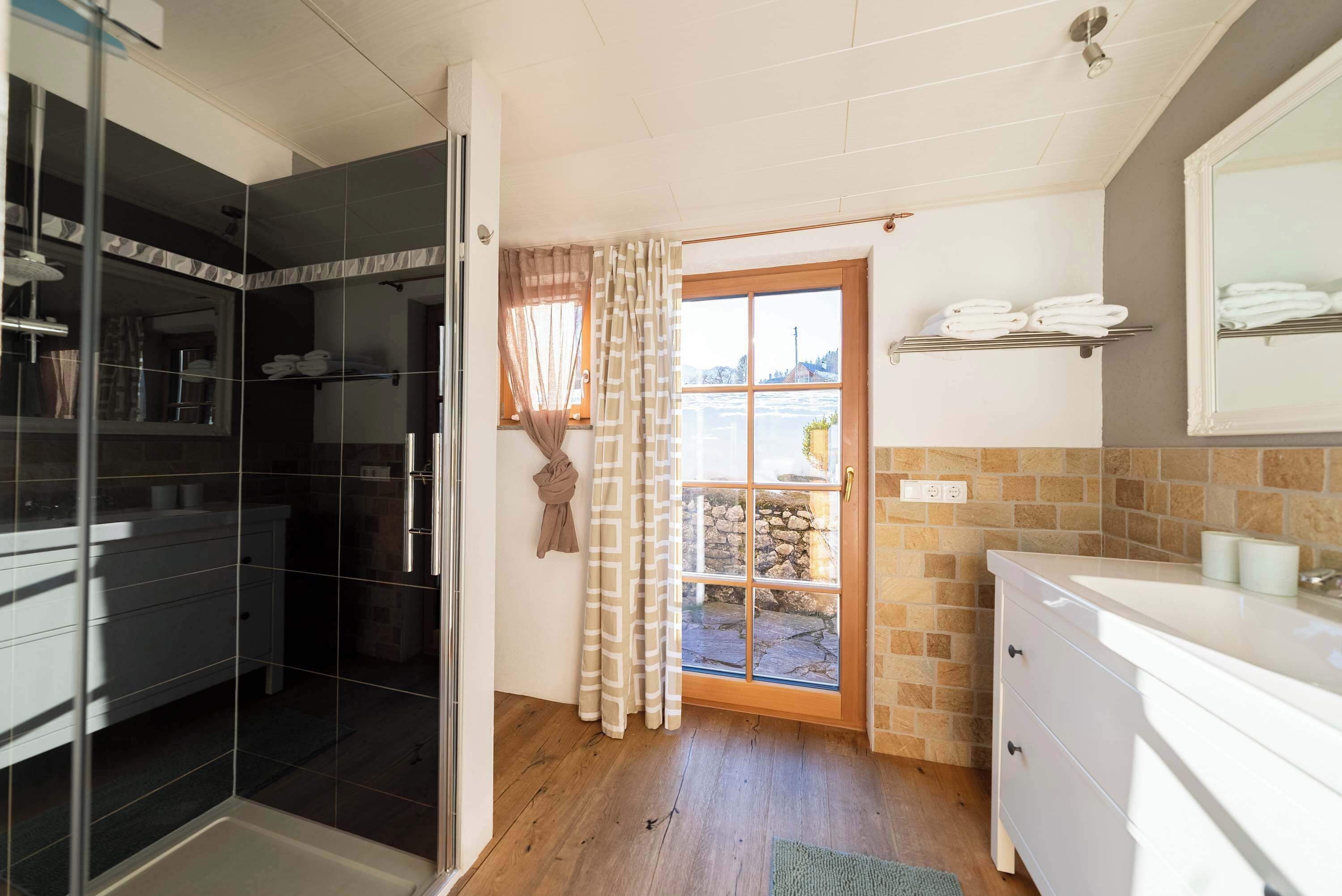 Shower, hair dryer, towels, shampoo