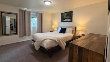 1 bedroom, desk, iron/ironing board, travel crib