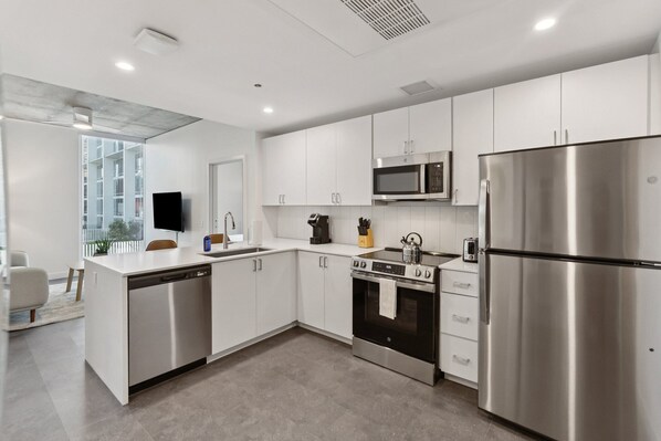 Suite, 2 camere da letto | Cucina privata | Frigorifero, microonde, forno, piano cottura