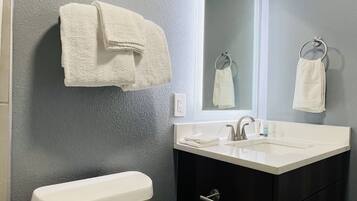 Towels, soap, shampoo, toilet paper