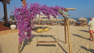 Plage, chaises longues