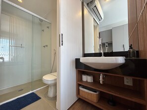 Premium Studio | Bathroom | Shower, soap, shampoo, toilet paper