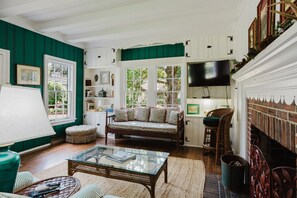 TV, fireplace, books