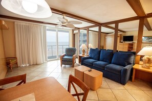 TV, books - Oceanfront 1BR Condo w/ Balcony & Kitchen (Daytona Beach Shores)