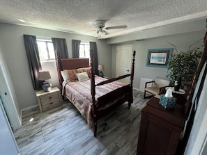 Family Apartment, Courtyard View | Premium bedding, pillowtop beds, individually decorated - Surfside Suites (Cocoa Beach)