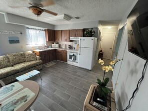 Family Apartment | Living area | 40-inch Smart TV with cable channels, toys