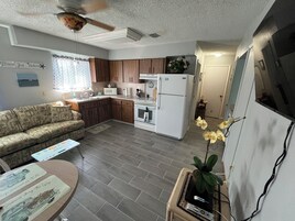 Family Apartment | Living area | 40-inch Smart TV with cable channels, toys