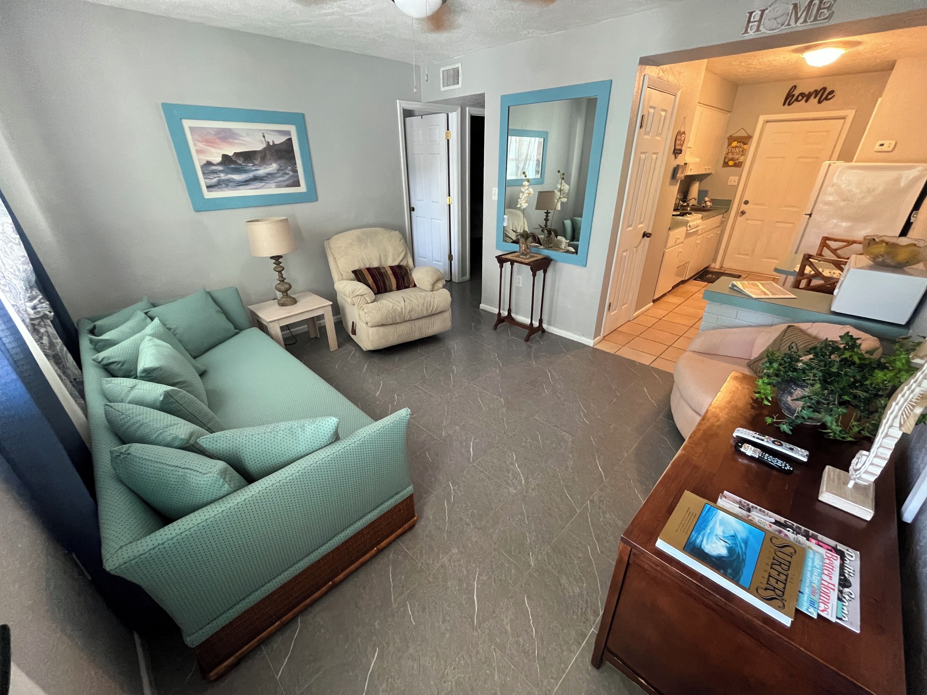 Family Apartment, Garden View | Living area | 40-inch Smart TV with cable channels, toys