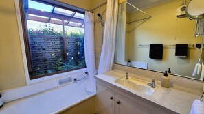 Shower, towels, soap, toilet paper