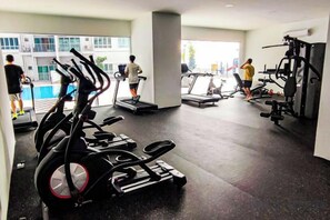 A gym with cardio machines, a treadmill, and weight equipment. - Lovely Family Suites at Razak City Kuala Lumpur by HCK (Kuala Lumpur)