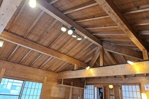 A wooden interior with high ceilings, large windows, and exposed beams. - Pet-friendly private vacation home Nasu Royal Villa (Nasu)