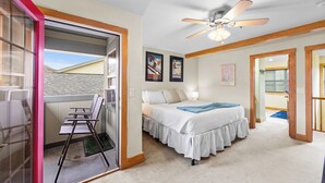 A bedroom with a bed, a ceiling fan, and a window. - Lrd204d2 (Dillon)