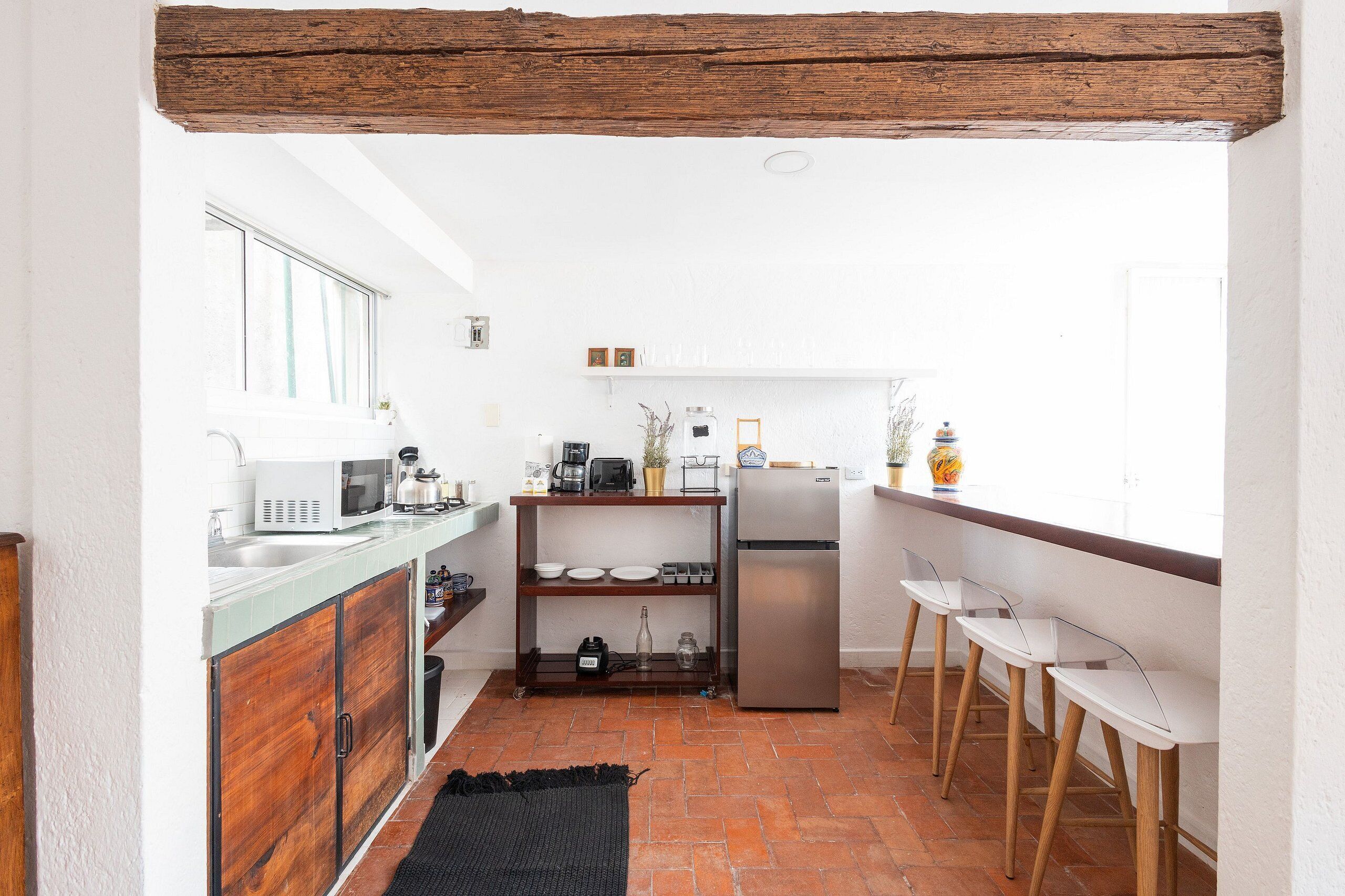 Fridge, microwave, coffee/tea maker, toaster