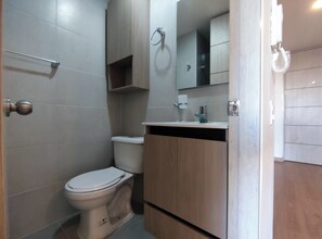 Hair dryer, towels, soap, toilet paper