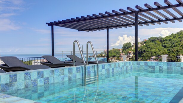 A heated pool - Condo Luz Romantic Zone with Rooftop Infinity Pool, Hot Tub (Puerto Vallarta)