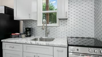 Fridge, microwave, dishwasher, coffee/tea maker