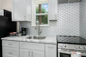 Fridge, microwave, dishwasher, coffee/tea maker