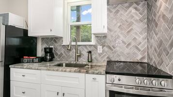 Fridge, microwave, dishwasher, coffee/tea maker