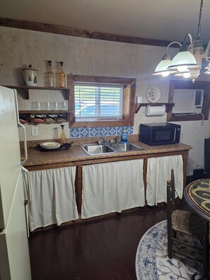 Fridge, microwave, coffee/tea maker, toaster