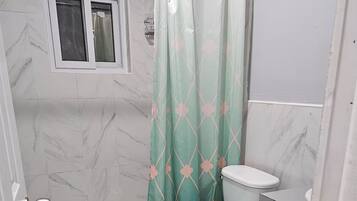 Hair dryer, towels, soap, toilet paper