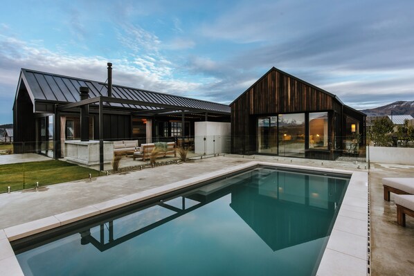 Seasonal outdoor pool, pool loungers