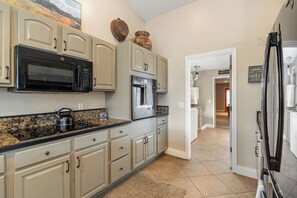 Fridge, stovetop, coffee/tea maker, toaster
