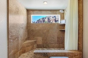 Shower, hair dryer, towels