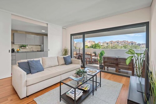 Rooftop Pools & Balcony Haven by HostWise