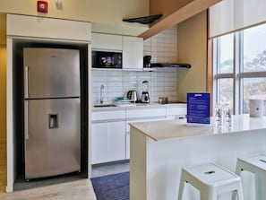 Microwave, coffee/tea maker, cookware/dishes/utensils