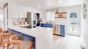 Fridge, microwave, oven, stovetop - Anchor Inn Paradise - Pet Friendly Beach Home WITH A GOLF CART! (New Smyrna Beach)