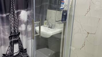 Hair dryer, towels, soap, toilet paper