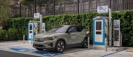 A parking space with a charging station for electric vehicles.