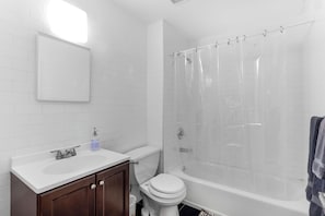Hair dryer, towels, soap, toilet paper