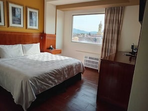 Single Room, 1 King Bed, Non Smoking, City View | Laptop workspace, iron/ironing board, free WiFi, bed sheets