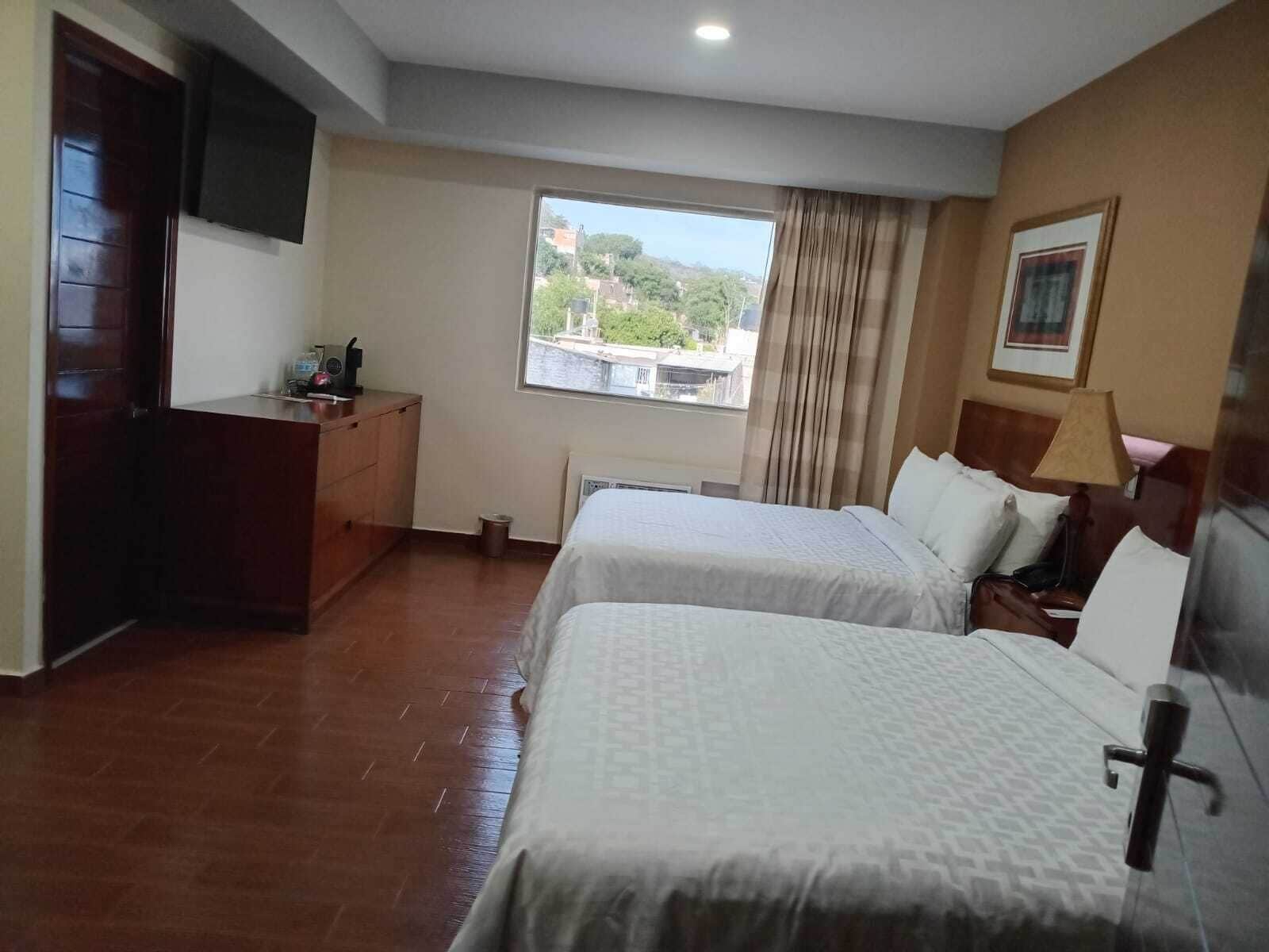 Double Room, 2 Queen Beds, Non Smoking | Laptop workspace, iron/ironing board, free WiFi, bed sheets