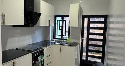 Lovely 2-bedroom apartment in kotu near the fire service with AC