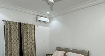 Lovely 2-bedroom apartment in kotu near the fire service with AC
