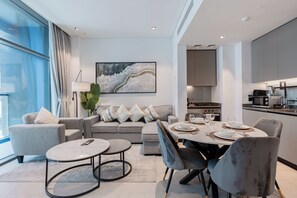 Deluxe Apartment, Balcony, City View | Living area