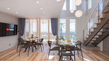 Villa Luxe, vue océan | Coin séjour | Télévision à écran plat de 65 pouces avec chaînes par câble