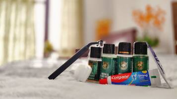 A collection of personal care products on a white surface.