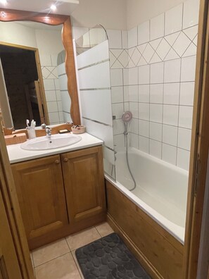 Jetted bath, bidet, towels, soap