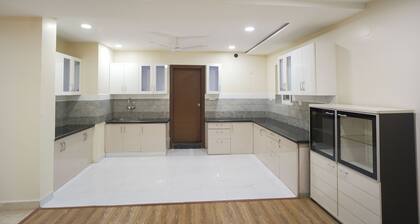 Stay Pride Service Apartments - AC Rooms in Vijayawada - Family & Business Stays