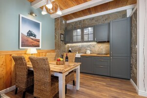 Suite, City View | Blackout drapes, iron/ironing board, free WiFi