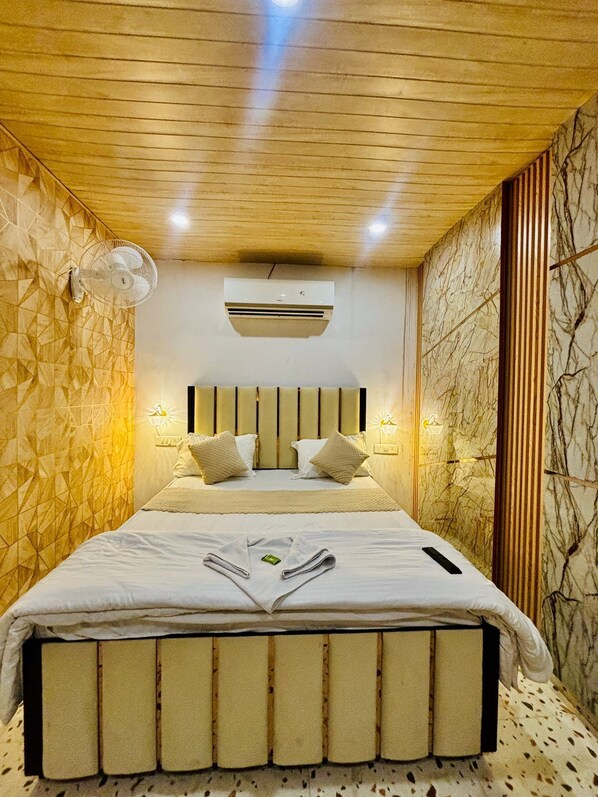 Quarto luxo | Camas extras/dobráveis (sobretaxa), Wi-Fi de cortesia, roupa de cama