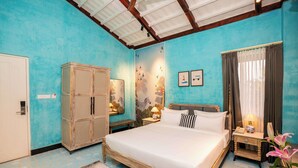 A bedroom with a bed, nightstands, a wardrobe, and a window with curtains. - Sisodia Bagh Luxury Boutique Resort (Amer)