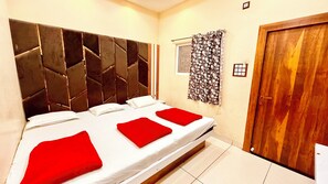 Premium bedding, desk, laptop workspace, soundproofing