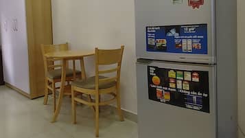 Habitación doble superior, vista a la ciudad | Área de sala de estar